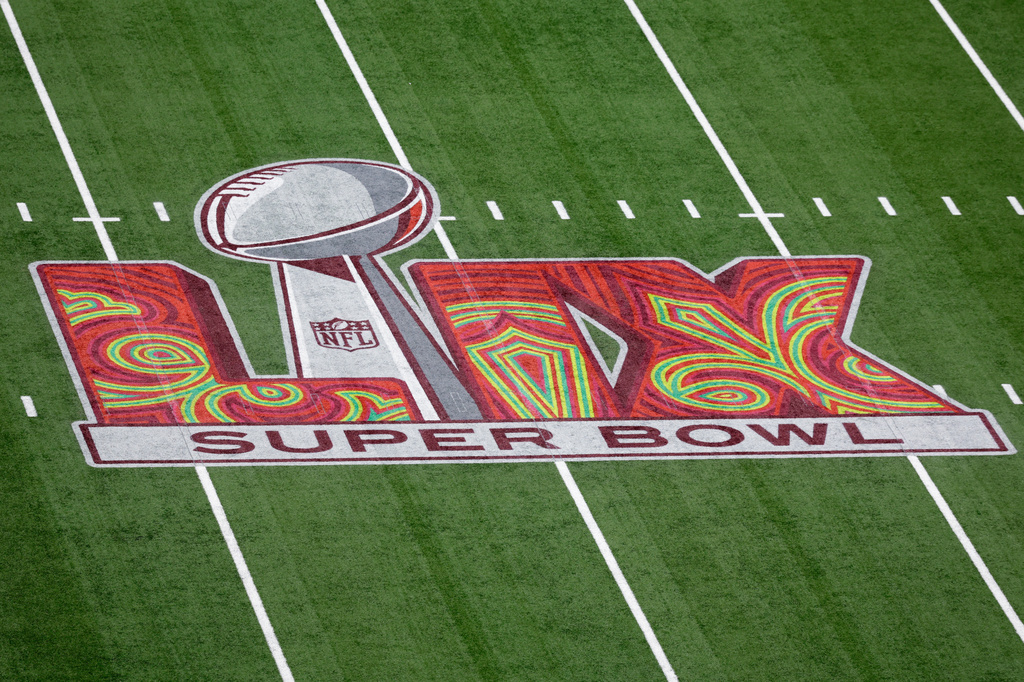 FILE - The logo for NFL Super Bowl 59 football game is seen on the field Feb. 9, 2025, in New Orleans. (AP Photo/Adam Hunger, File)