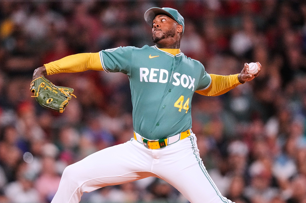Boston Red Sox's Aroldis Chapman delivers during the ninth inning of a baseball game against the Toronto Blue Jays, Friday, July 24, 2026, in Boston. (AP Photo/Charles Krupa)
