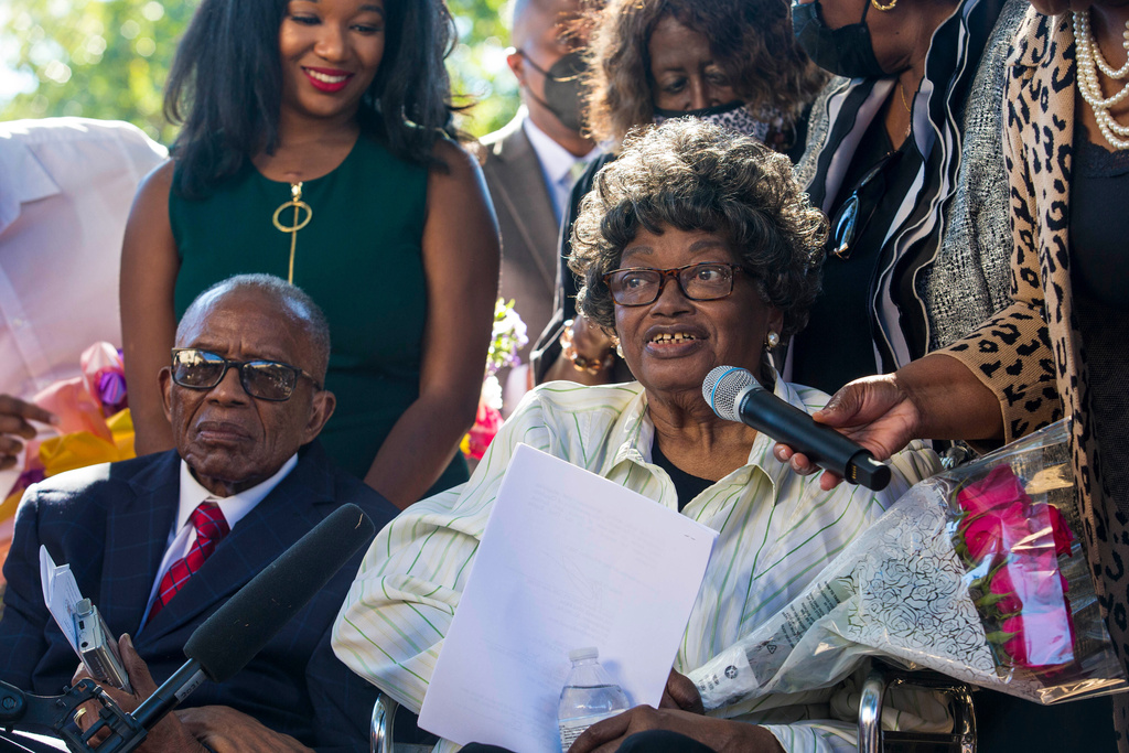 FILE - Claudette Colvin answers a question at a news conference after she filed paperwork to have her juvenile record expunged as she sits next to her former attorney, Fred Gray, Oct. 26, 2021, in Montgomery, Ala. (AP Photo/Vasha Hunt, File)