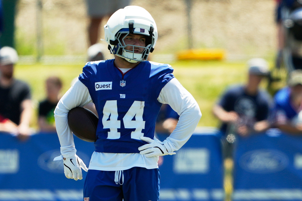 New York Giants running back Cam Skattebo practices during an NFL football training camp, Friday, July 31, 2026, in White Sulphur Springs, W.Va. (AP Photo/Chris Carlson)