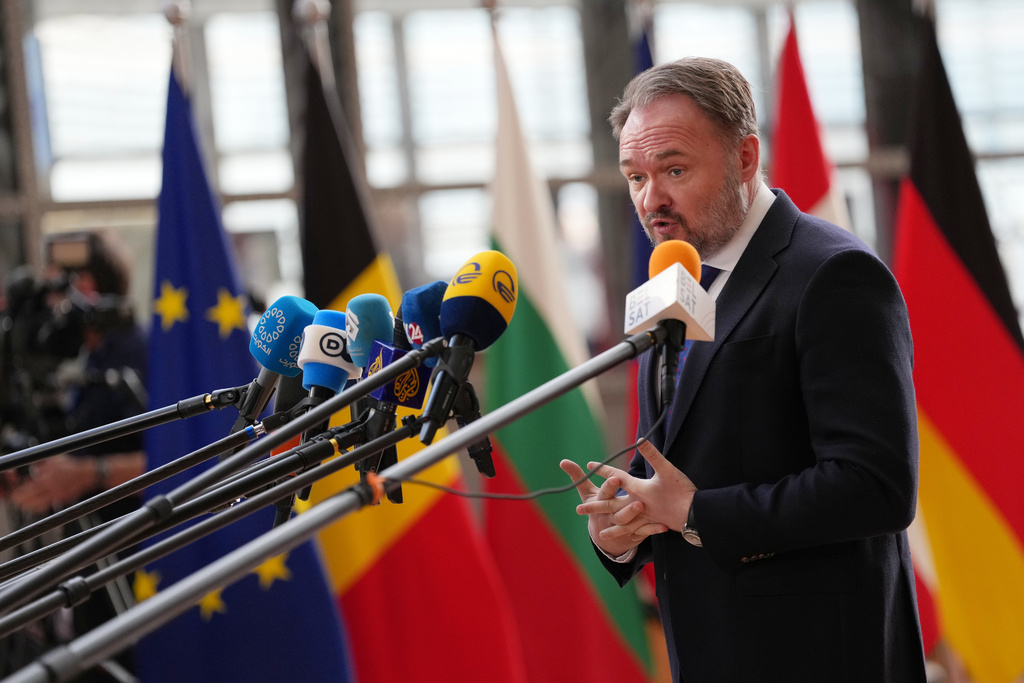 European Commissioner for Energy and Housing Dan Jorgensen speaks with the media as he arrives for a meeting of EU energy ministers at the European Council building in Brussels, Monday, March 16, 2026. (AP Photo/Virginia Mayo)