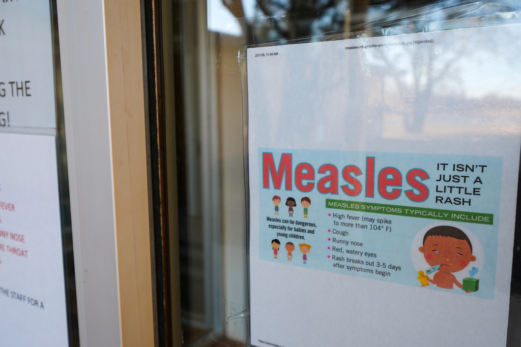 FILE - A sign is seen outside a clinic with the South Plains Public Health District, Feb. 23, 2025, in Brownfield, Texas. (AP Photo/Julio Cortez, File)