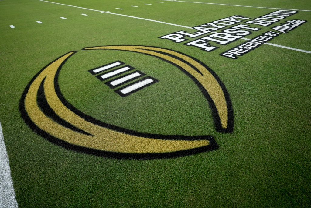 The College Football Playoff logo is seen at Kyle Field before the start of a first round of the College Football Playoff game between Miami and Texas A&M on Saturday, Dec. 20, 2025, in College Station, Texas. (AP Photo/Sam Craft)