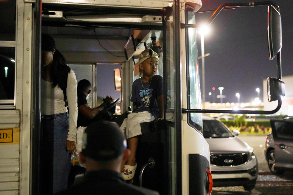 FILE - A Vietnamese child deported from the U.S. arrives in Panama City, March 8, 2025. (AP Photo/Matias Delacroix, File)