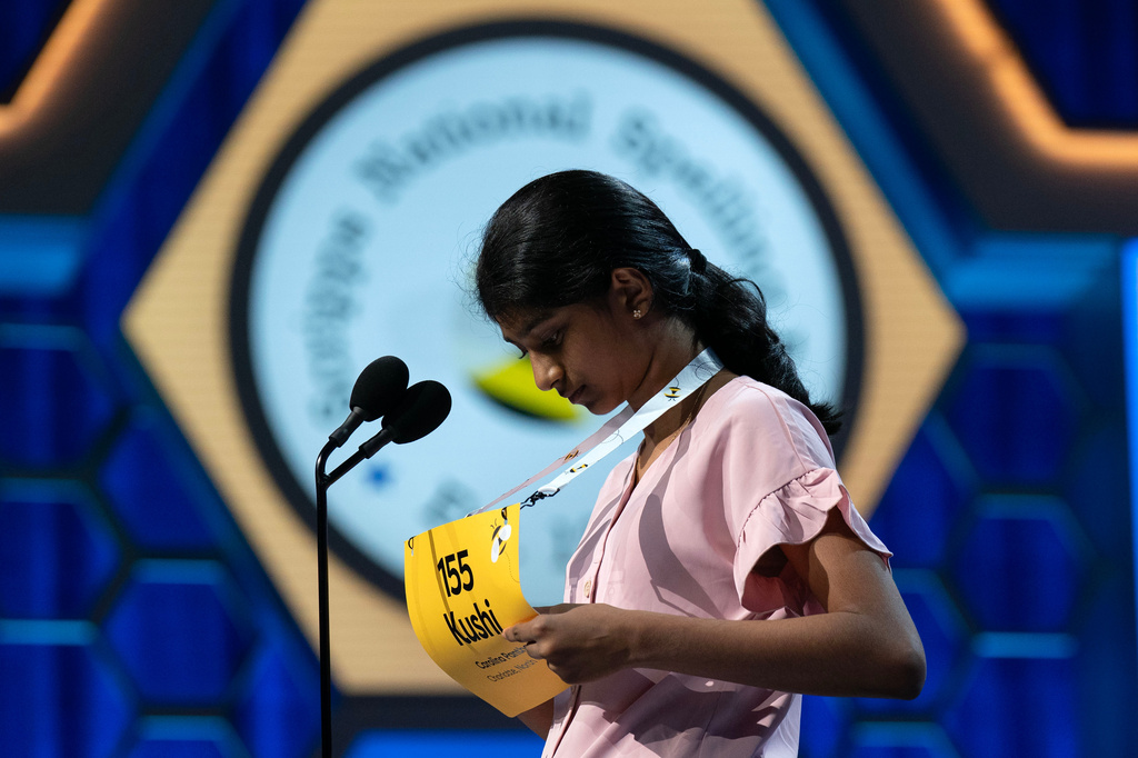 Kushi Gottimukkala, 13, of Morrisville, N.C., spells her word during the semifinals of the Scripps National Spelling Bee at DAR Constitution Hall, Wednesday, May 27, 2026, in Washington. (AP Photo/Jose Luis Magana)