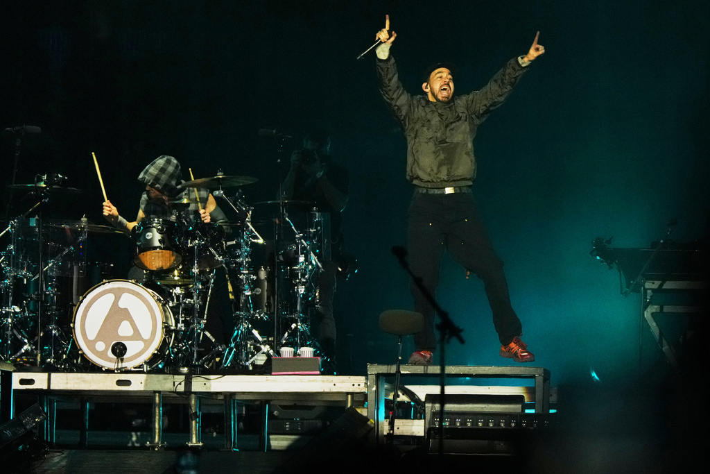 Mike Shinoda, singer of the U.S. rock band Linkin Park, performs during the Corona Capital music festival in Mexico City, Sunday, Nov. 16, 2025. (AP Photo/Claudia Rosel)