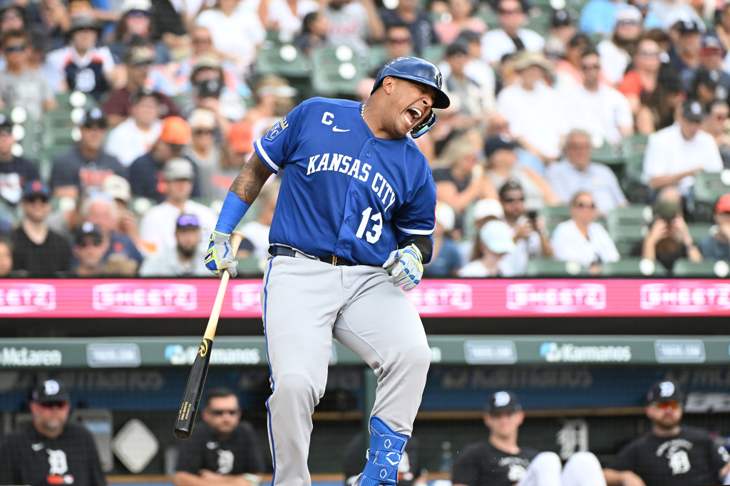 Kansas City Royals designated hitter Salvador Perez reacts after being hit by a pitch during the first inning of a baseball game against the Detroit Tigers, Sunday, July 26, 2026, in Detroit. (AP Photo/Jose Juarez)