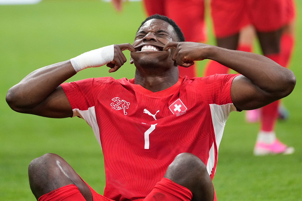 Switzerland's Breel Embolo (7) celebrates after scoring his team's first goal during the World Cup round of 32 soccer match between Switzerland and Algeria in Vancouver, British Columbia, Thursday, July 2, 2026. (AP Photo/Lindsey Wasson)