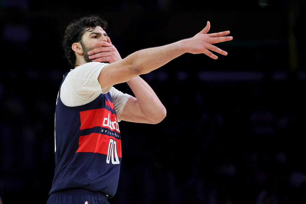 Washington Wizards forward Tristan Vukcevic celebrates after making a three-point basket during the first half of an NBA basketball game against the Los Angeles Lakers Monday, March 30, 2026, in Los Angeles. (AP Photo/Ryan Sun)