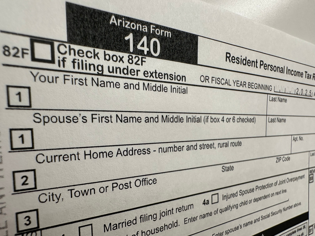 An Arizona state personal income tax form is shown Tuesday, April 7, 2026, in Jefferson City, Mo. (AP Photo/David A. Lieb)
