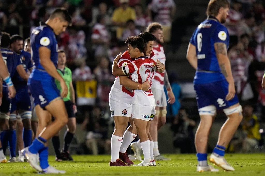Japan's team players celebrate after their win over Italy during the Nations Championship rugby match between Japan and Italy in Tokyo, Saturday, July 4, 2026. (AP Photo/Shuji Kajiyama)