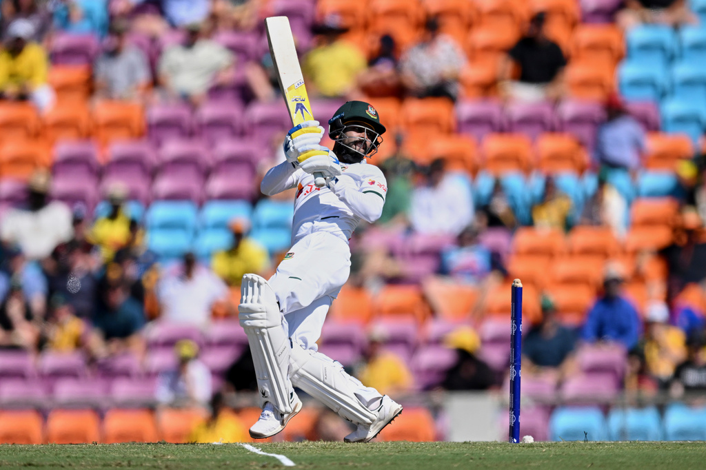 Mehidy Hasan Miraz of Bangladesh bats during play on day three of the first cricket test against Australia in Darwin, Australia, Saturday, Aug.15, 2026, (James Ross/AAPImage via AP)