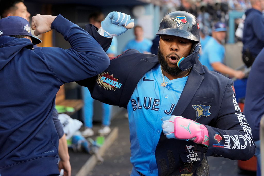Toronto Blue Jays' Vladimir Guerrero Jr. celebrates his home run during the first inning in Game 5 of baseball's World Series against the Los Angeles Dodgers, Wednesday, Oct. 29, 2025, in Los Angeles. (AP Photo/Ashley Landis)