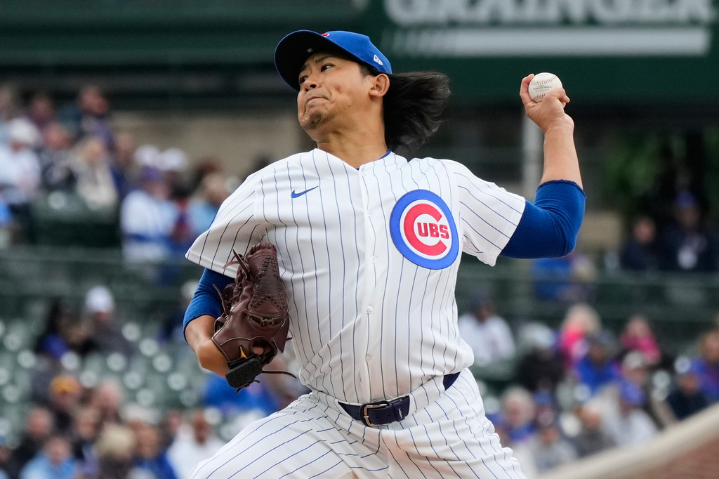 Chicago Cubs starting pitcher Shota Imanaga, of Japan, throws during the first inning of a baseball game against the Cincinnati Reds in Chicago, Thursday, May 7, 2026. (AP Photo/Nam Y. Huh)