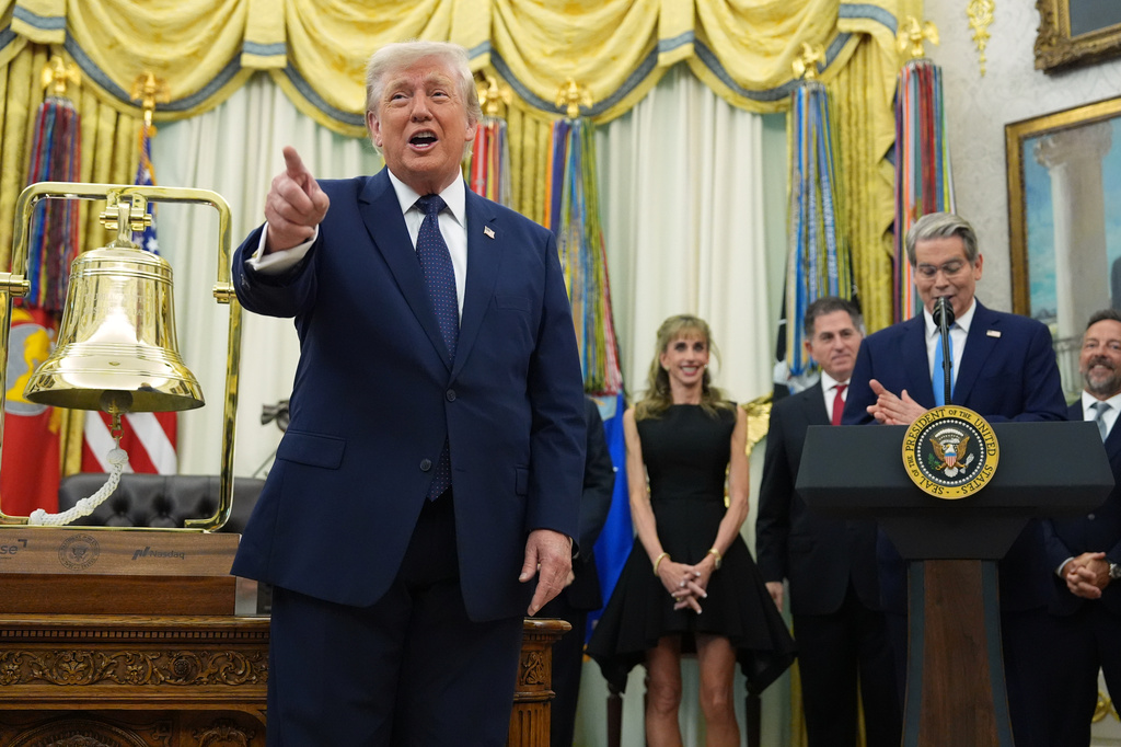 President Donald Trump speaks before ringing the opening bell for the New York Stock Exchange and the Nasdaq in the Oval Office at the White House, Monday, July 6, 2026, in Washington, as Treasury Secretary Scott Bessent stands at the podium. (AP Photo/Mark Schiefelbein)