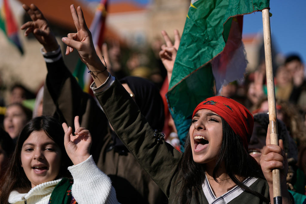 Protesters from the Kurdish community chant slogans during a protest to condemn Syrian government military operations against the Syrian Democratic Forces (SDF) in Syria, outside the ESCWA headquarters in Beirut, Lebanon, Tuesday, Jan. 20, 2026. (AP Photo/Bilal Hussein)