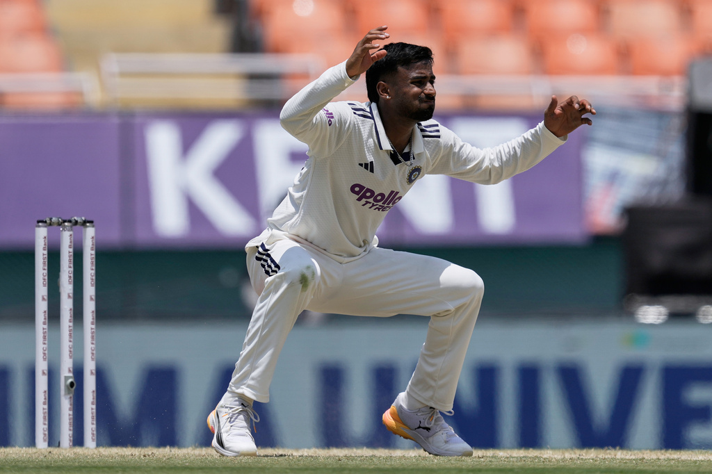 India's Manav Suthar reacts after bowling a delivery on day three of the cricket test match between Afghanistan and India in New Chandigarh, India, Monday, June 8, 2026. (AP Photo/Ashwini Bhatia)