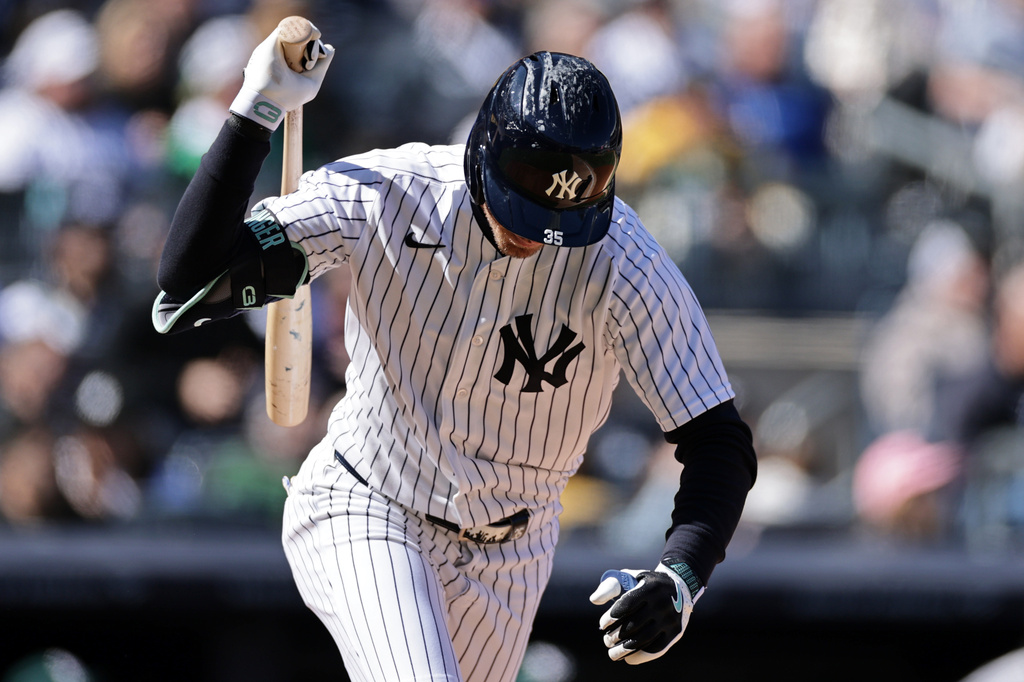 New York Yankees' Cody Bellinger reacts to flying out during the seventh inning of a baseball game against the Athletics, Thursday, April 9, 2026, in New York. (AP Photo/Adam Hunger)