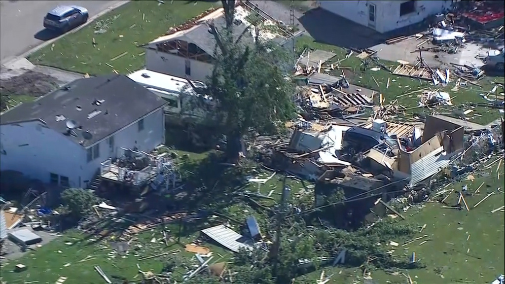 This photo made from video provided by WLS shows an aerial view of storm damage and a tornado-ravaged area on Friday, June 12, 2026, in Merrillville, Ind. (WLS via AP)