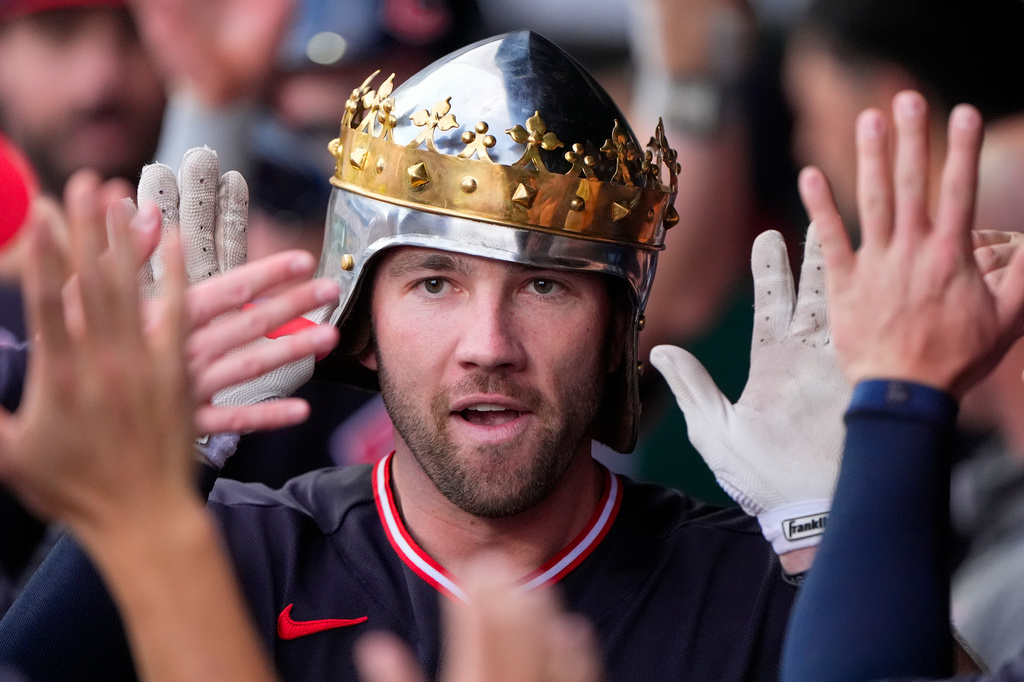 Cleveland Guardians' David Fry celebrates in the dugout after hitting a two-run home run during the second inning of a baseball game against the Kansas City Royals, Monday, May 4, 2026, in Kansas City, Mo. (AP Photo/Charlie Riedel)