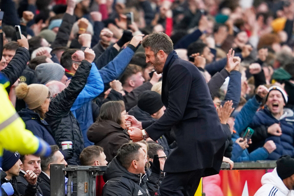 Manchester United's head coach Michael Carrick celebrates during the English Premier League soccer match between Manchester United and Manchester City in Manchester, England, Saturday, Jan. 17, 2026. (AP Photo/Dave Thompson)