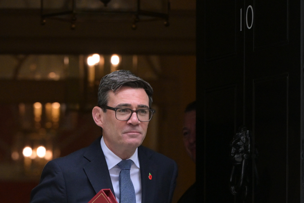 Britain's Prime Minister Andy Burnham leaves 10 Downing Street to attend the weekly Prime Ministers' Questions session in parliament in London, Wednesday, Oct. 28, 2026.(AP Photo/Thomas Krych)