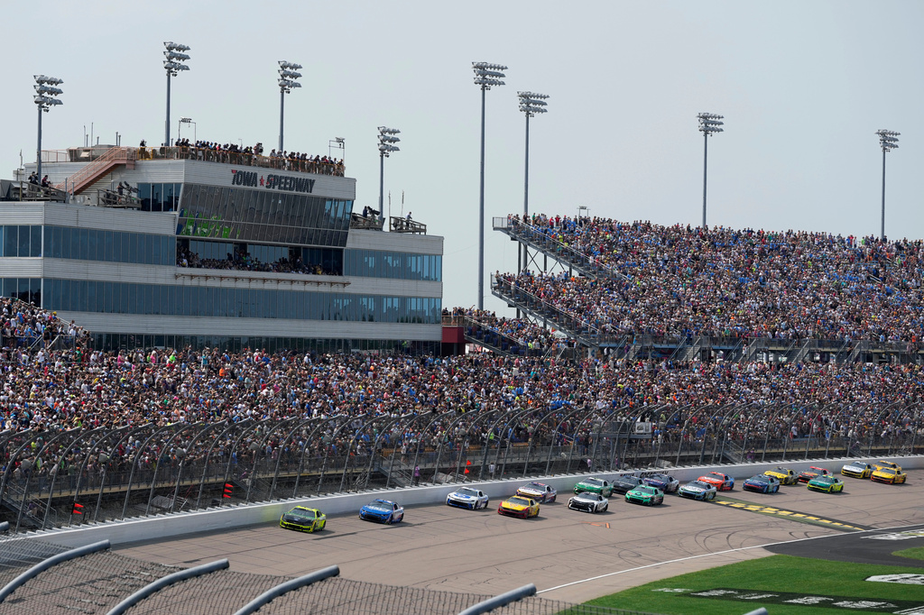Ryan Blaney leads the field at the start of a NASCAR Cup Series auto race, Sunday, Aug. 9, 2026, at Iowa Speedway in Newton, Iowa. (AP Photo/Charlie Neibergall)