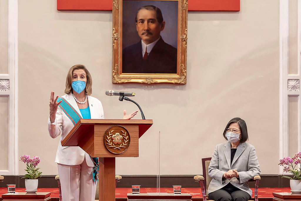 FILE - In this photo released by the Taiwan Presidential Office, U.S. House Speaker Nancy Pelosi speaks during a meeting with then Taiwanese President President Tsai Ing-wen, at right, in Taipei, Taiwan, Wednesday, Aug. 3, 2022. (Taiwan Presidential Office via AP, File)