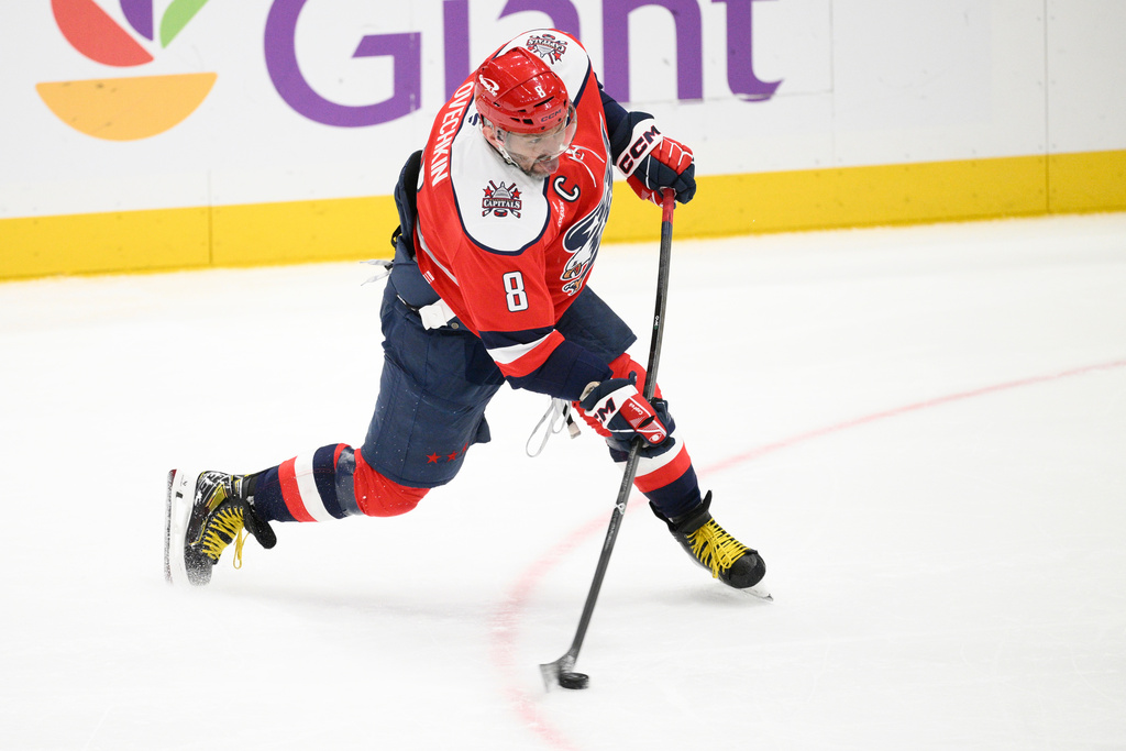 Washington Capitals left wing Alex Ovechkin shoots during the third period of an NHL hockey game against the Chicago Blackhawks, Saturday, Jan. 3, 2026, in Washington. (AP Photo/Nick Wass)