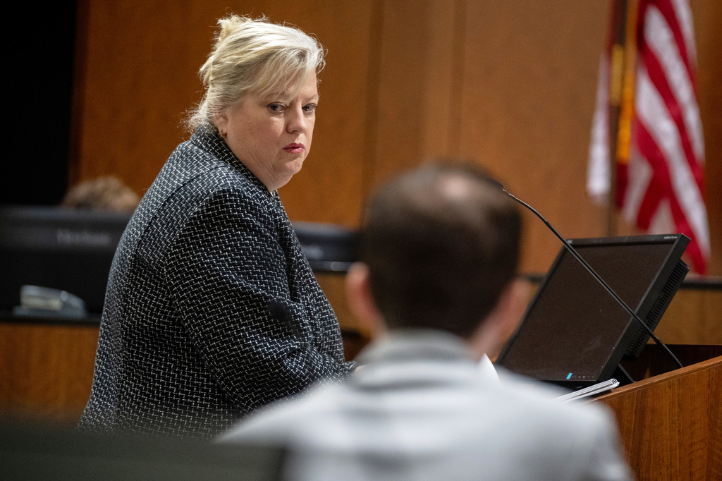 Defense attorney Kathryn Nester looks back past Tyler Robinson, who is accused of fatally shooting Charlie Kirk, during a preliminary hearing in 4th District Court, in Provo, Utah, Tuesday, July 7, 2026. (Trent Nelson/The Salt Lake Tribune via AP, Pool)