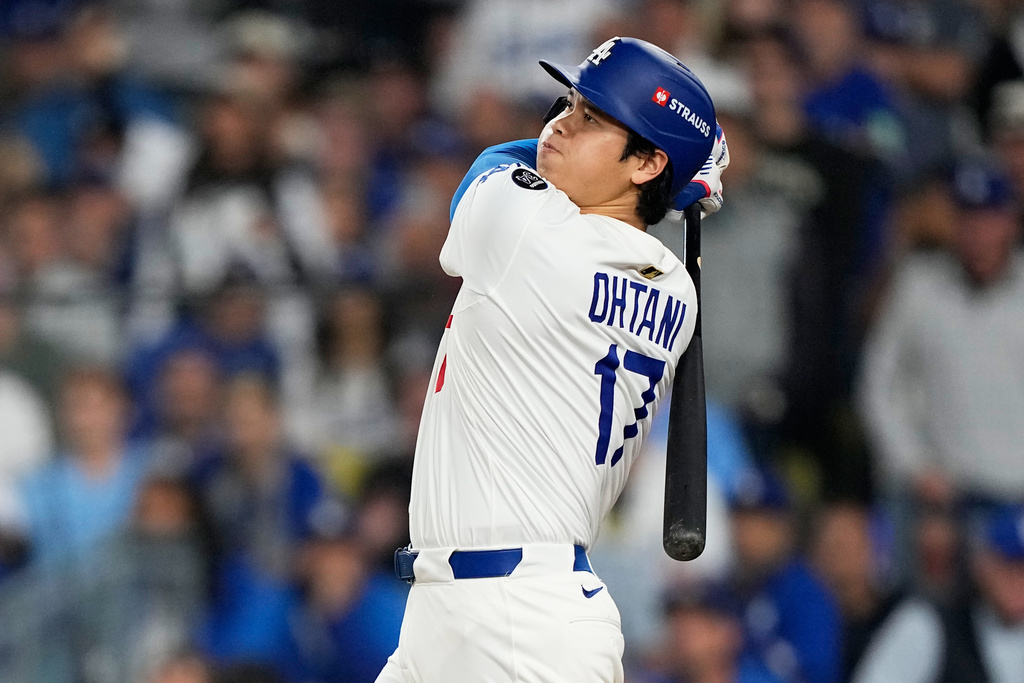 FILE - Los Angeles Dodgers' Shohei Ohtani watches his home run against the Toronto Blue Jays during the seventh inning in Game 3 of baseball's World Series, Monday, Oct. 27, 2025, in Los Angeles. (AP Photo/Brynn Anderson, File)