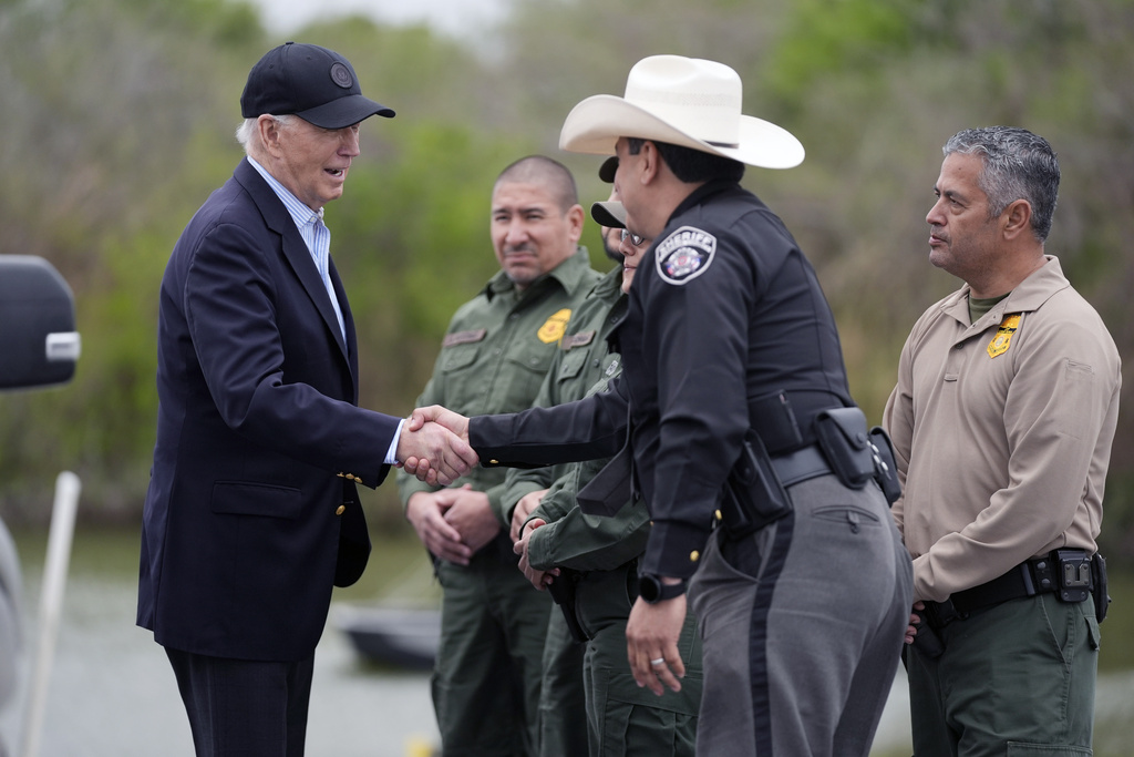 Judge strikes down Biden administration program shielding immigrant ...