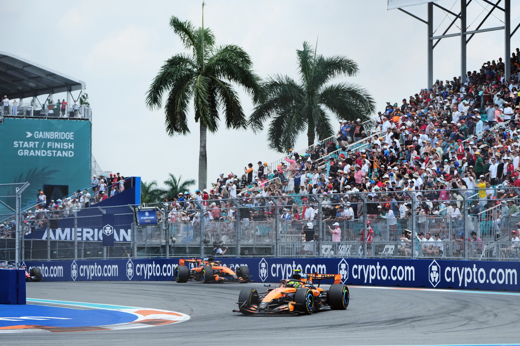McLaren driver Lando Norris, right, of Britain and McLaren driver Oscar Piastri of Australia steers their cars during a sprint auto race at the Miami Formula One Grand Prix, Saturday, May 2, 2026, in Miami Gardens, Fla. (AP Photo/Lynne Sladky)