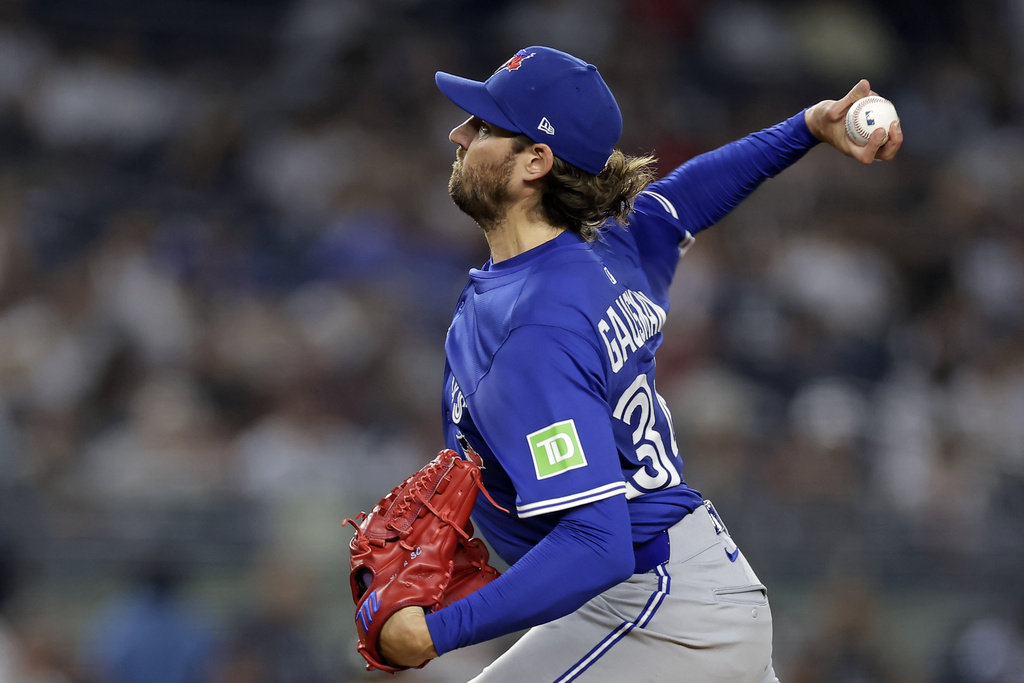Toronto Blue Jays pitcher Kevin Gausman throws during the first inning of a baseball game against the New York Yankees, Friday, Sept. 5, 2025, in New York. (AP Photo/Adam Hunger)