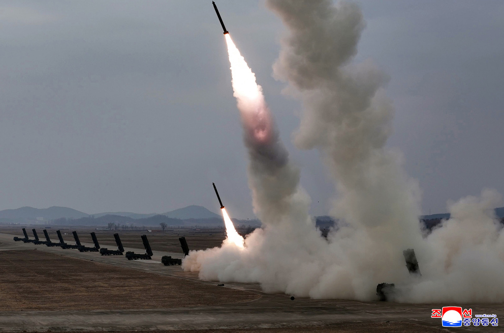 This photo provided by the North Korean government shows a test firing of multiple rocket launch systems, at an undisclosed place in North Korea Saturday, March 14, 2026. Independent journalists were not given access to cover the event depicted in this image distributed by the North Korean government. The content of this image is as provided and cannot be independently verified. Korean language watermark on image as provided by source reads: "KCNA" which is the abbreviation for Korean Central News Agency. (Korean Central News Agency/Korea News Service via AP)