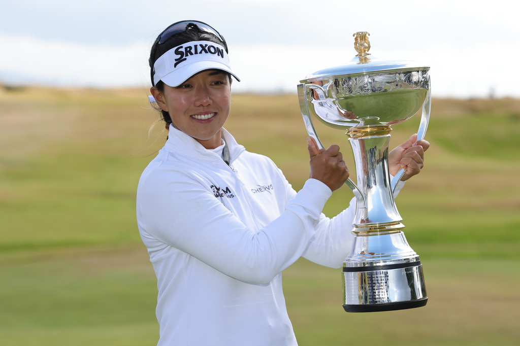 Jenny Shin of South Korea celebrates winning the 2026 ISPS HANDA Women's Scottish Open at Dundonald Links, Ayrshire, Sunday July 26, 2026. (Steve Welsh/PA via AP)