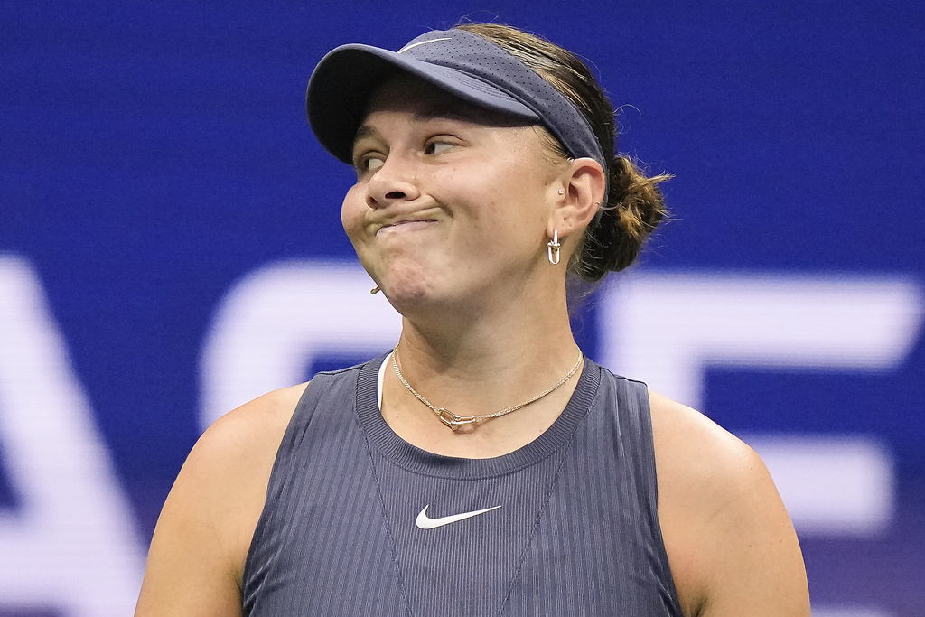 Amanda Anisimova, of the United States, reacts after losing a point to Aryna Sabalenka, of Belarus, during the women's singles final of the U.S. Open tennis championships, Saturday, Sept. 6, 2025, in New York. (AP Photo/Frank Franklin)