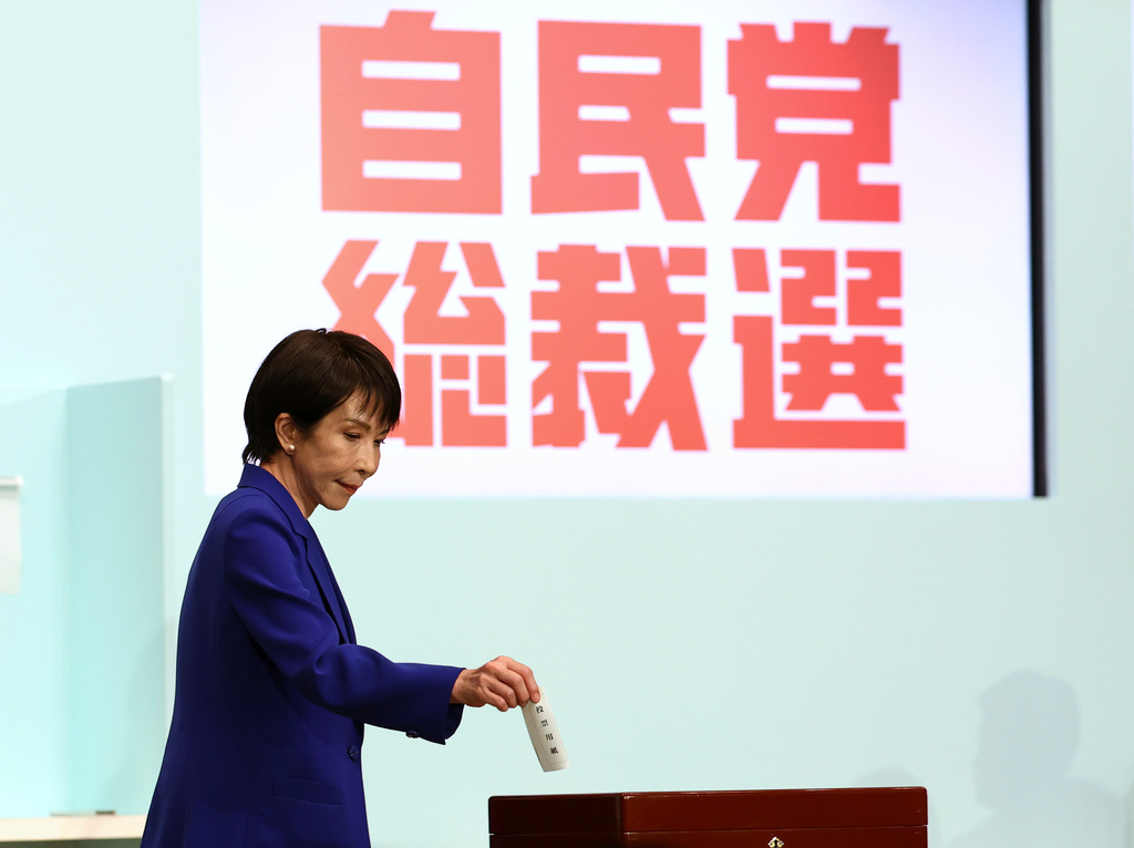 Former Economic Security Minister Sanae Takaichi votes at the Liberal Democratic Party's (LDP) leadership election in Tokyo, Japan, Saturday, Oct. 4, 2025. (Kim Kyung-Hoon/Pool Photo via AP)