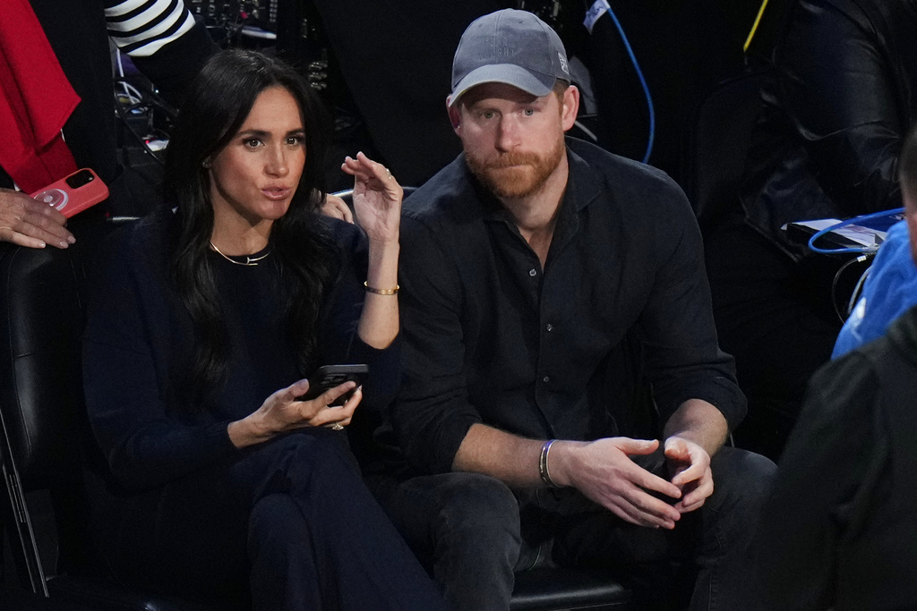 Prince Harry and Meghan Markle attend the NBA All-Star basketball game Sunday, Feb. 15, 2026, in Inglewood, Calif. (AP Photo/Jae C. Hong)