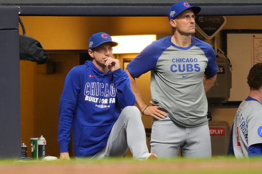 Chicago Cubs manager Craig Counsell, left, and bench coach Ryan Flaherty, right, look on from the dugout during the seventh inning of Game 5 of baseball's National League Division Series against the Milwaukee Brewers, Saturday, Oct. 11, 2025, in Milwaukee. (AP Photo/Kayla Wolf) Chicago Cubs manager Craig Counsell, left, and bench coach Ryan Flaherty, right, look on from the dugout during the seventh inning of Game 5 of baseball's National League Division Series against the Milwaukee Brewers, Saturday, Oct. 11, 2025, in Milwaukee. (AP Photo/Kayla Wolf)