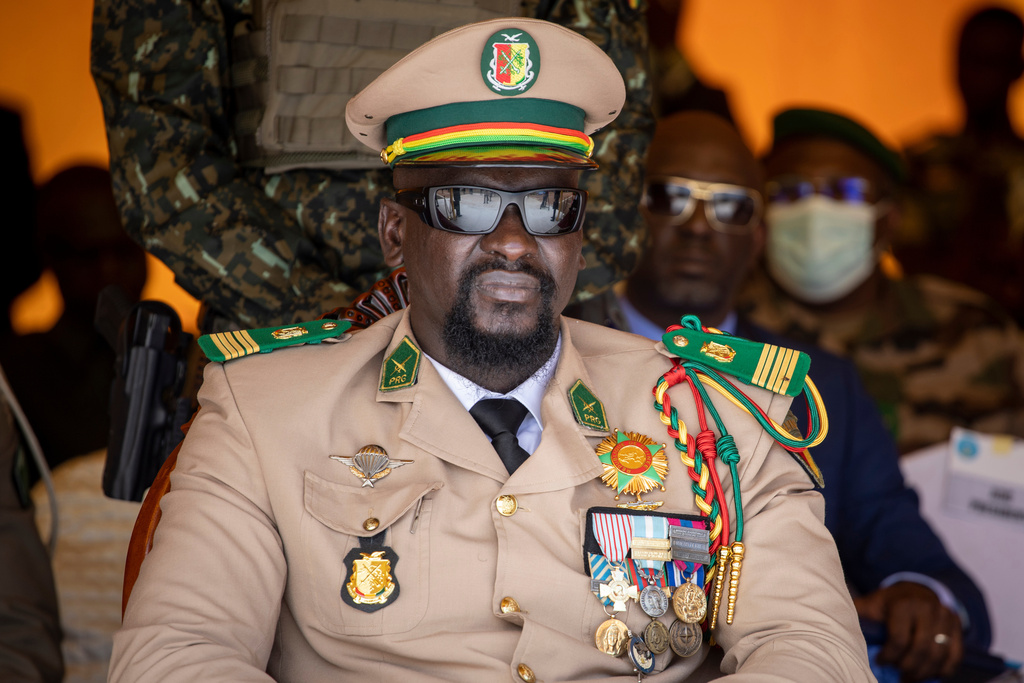 FILE - Guinea's junta leader Col. Mamady Doumbouya watches over an independence day military parade in Bamako, Mali on Sept. 22, 2022. (AP Photo, File)
