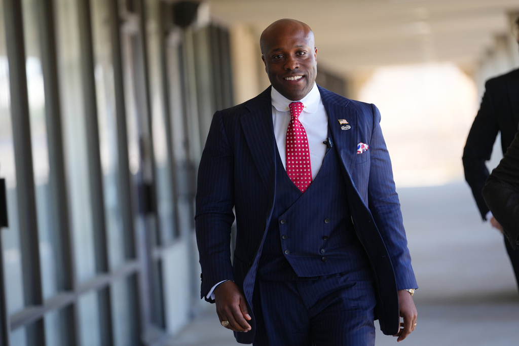 U.S. Rep. Wesley Hunt, R-Texas, arrives at a campaign event, Monday, Feb. 16, 2026, in Dallas. (AP Photo/Julio Cortez)