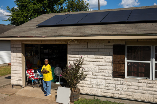 Doris Brown, Hub home captain, poses for a portrait under her solar panels on Wednesday, Oct. 8, 2025, in Houston. (AP Photo/Antranik Tavitian) Doris Brown, Hub home captain, poses for a portrait under her solar panels on Wednesday, Oct. 8, 2025, in Houston. (AP Photo/Antranik Tavitian)