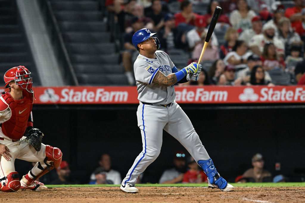Kansas City Royals Salvador Perez hits a three-run double against the Los Angeles Angels in the ninth inning of a baseball game Thursday, Sept. 25, 2025, in Anaheim, Calif. (AP Photo/Wally Skalij)