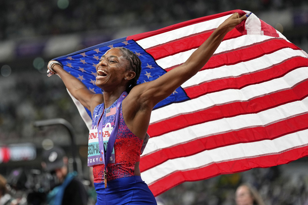 United States' Melissa Jefferson-Wooden celebrates as she wins the gold medal in the women's 200 meters final at the World Athletics Championships in Tokyo, Friday, Sept. 19, 2025. (AP Photo/Petr David Josek)
