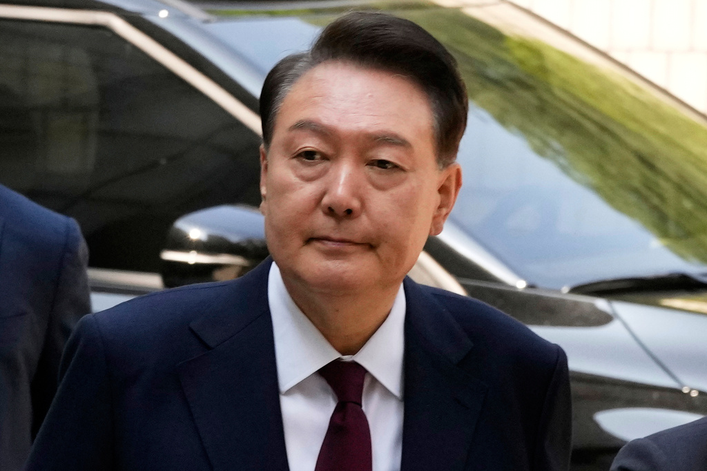 South Korea's ousted former President Yoon Suk Yeol arrives to attend his trial at the Seoul Central District Court in Seoul, South Korea, May 12, 2025. (AP Photo/Ahn Young-joon, Pool, File)