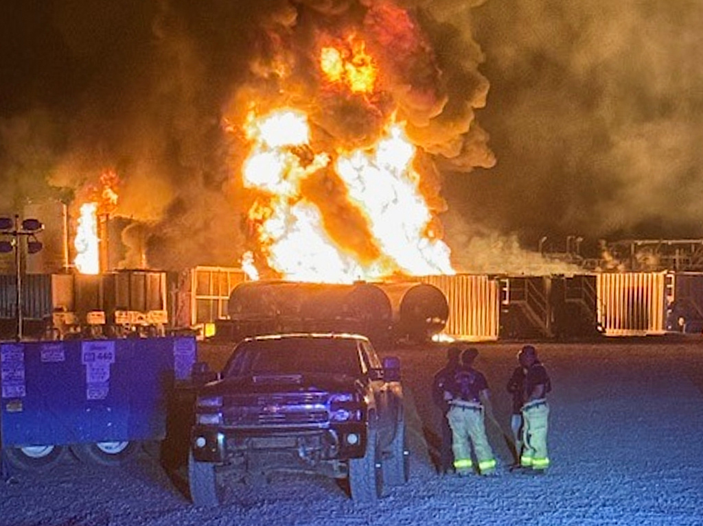 This photo provided by the Nacogdoches County Sheriff's Office shows a fire burning at a H&P drilling company well Monday, April 20, 2026, about 20 miles away from Nacogdoches, Texas. (Nacogdoches County Sheriff's Office via AP)