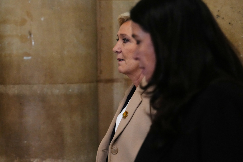 Far-right leader Marine Le Pen arrives for her appeal trial, in Paris, France, Wednesday, Feb. 11, 2026. (AP Photo/Aurelien Morissard)