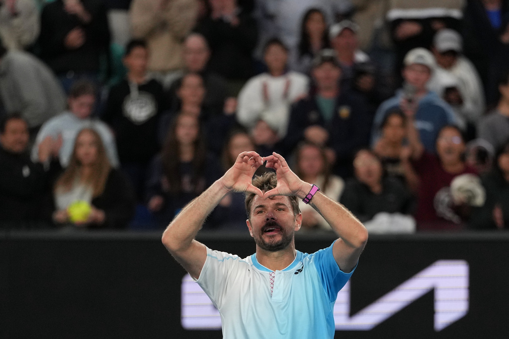 Stan Wawrinka of Switzerland celebrates after defeating Arthur Gea of France in their second round match at the Australian Open tennis championship in Melbourne, Australia, Thursday, Jan. 22, 2026. (AP Photo/Asanka Brendon Ratnayake)