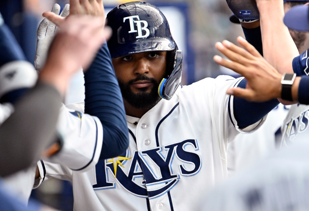 Tampa Bay Rays Junior Caminero celebrates after scoring on an RBI single by Jonathan Aranda, not pictured, during the third inning of a baseball game against the Kansas City Royals Wednesday, June 24, 2026, in St. Petersburg, Fla. (AP Photo/Jason Behnken)